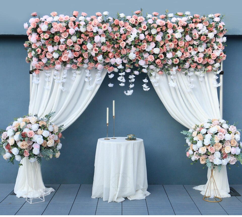 orange flower arrangements with black accents