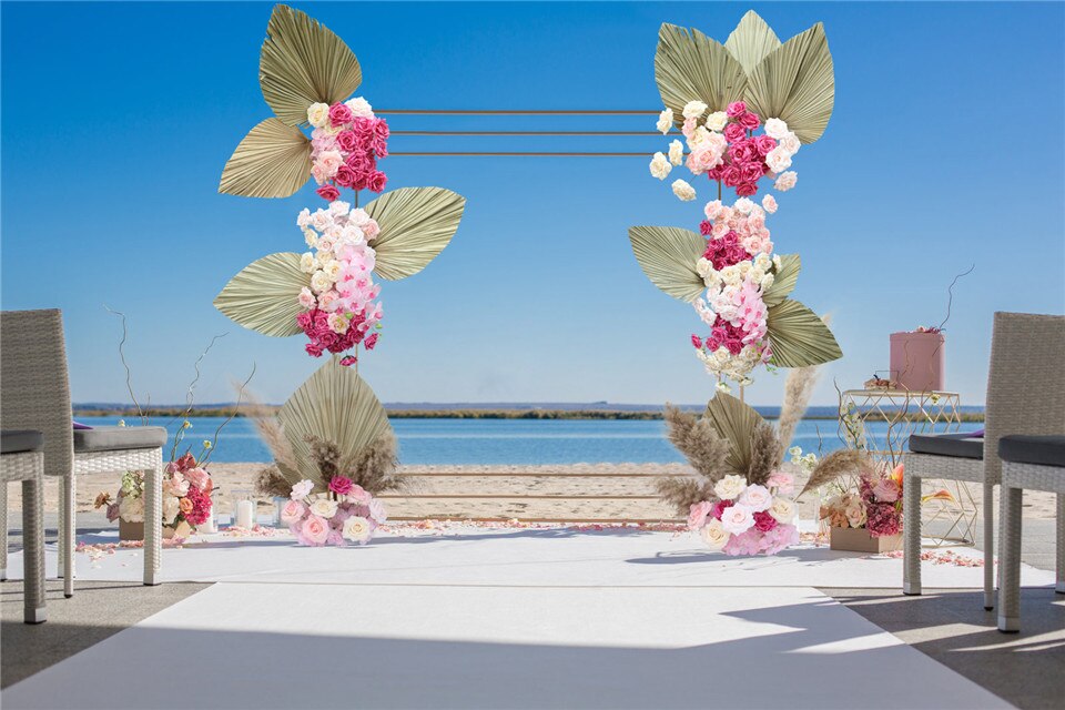 Anchoring methods for a metal wedding arch in outdoor settings.